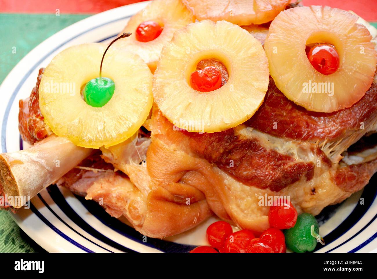 Baked Christmas Ham Covered with Pineapple Slices and Cherries Stock