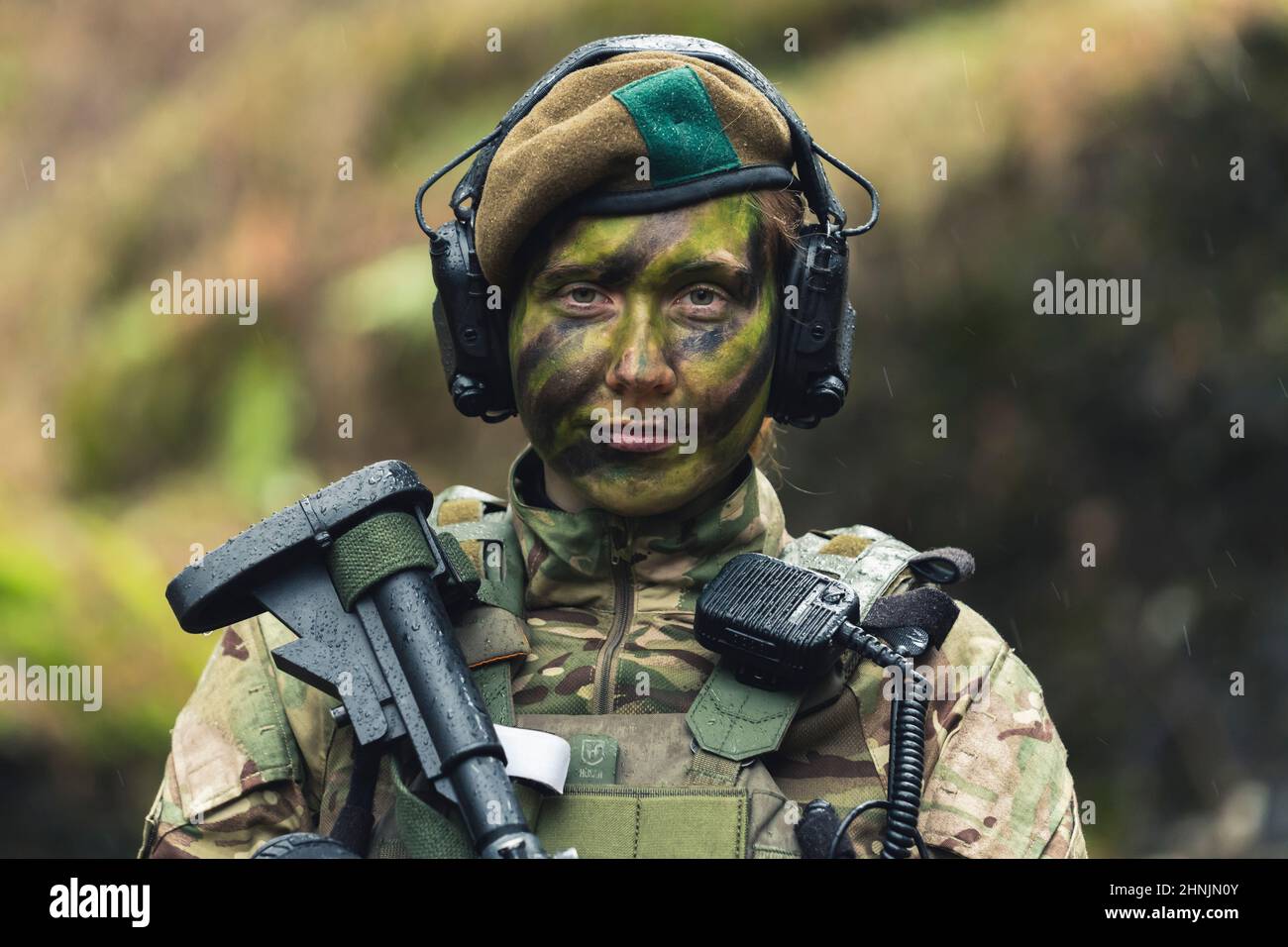 Cold hearted tough woman soldier serving her motherland . High quality photo Stock Photo