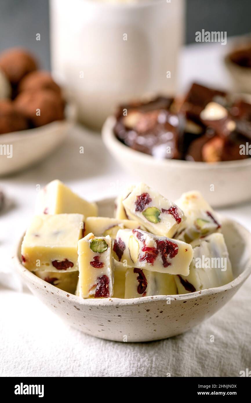 Variety of homemade toffee chocolate almond nuts candy, dark chocolate truffle, white chocolate