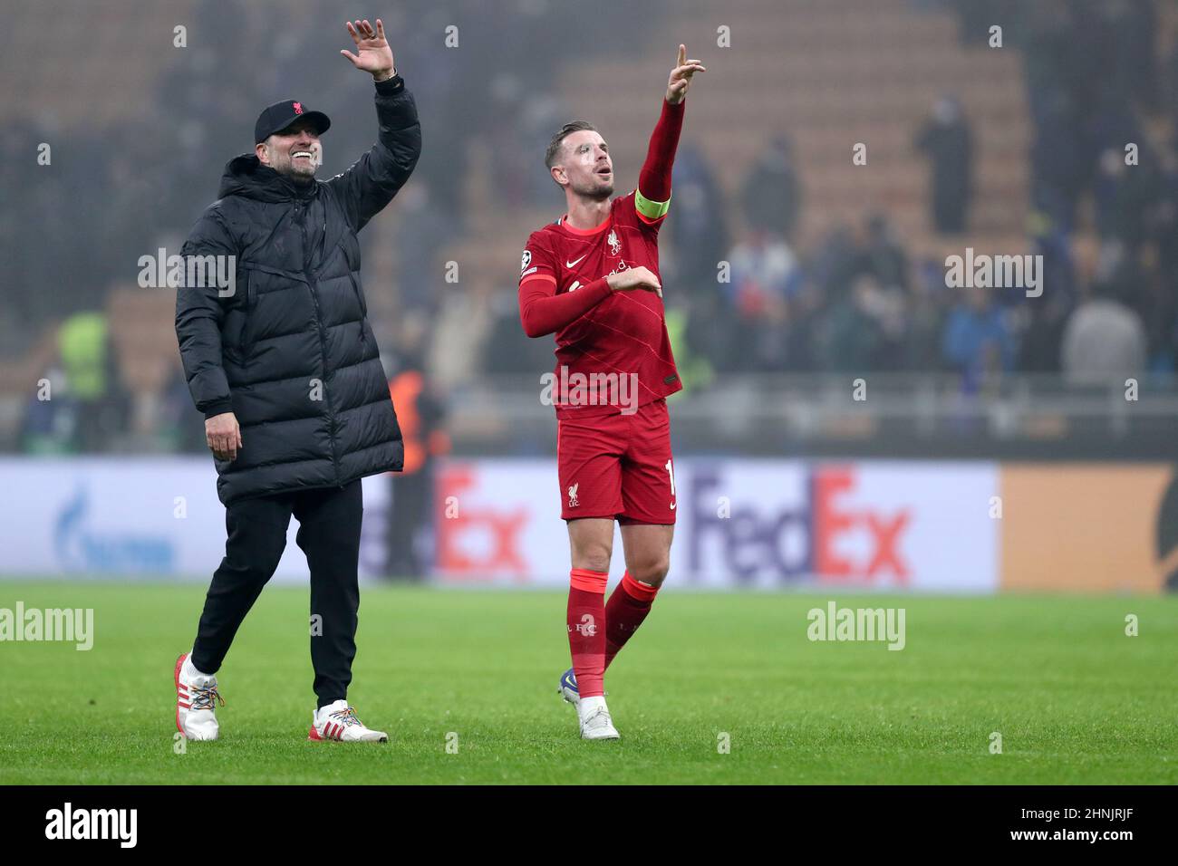 Milan, Italy, February 16, 2022, Jurgen Klopp, head coach of Liverpool Fc and Jordan Henderson of Liverpool Fc celebrate after winning  the UEFA Champions League Round Of Sixteen Leg One match between Fc Internazionale and Liverpool Fc at Stadio Giuseppe Meazza on Februart 16, 2022 in Milan, Italy . Stock Photo