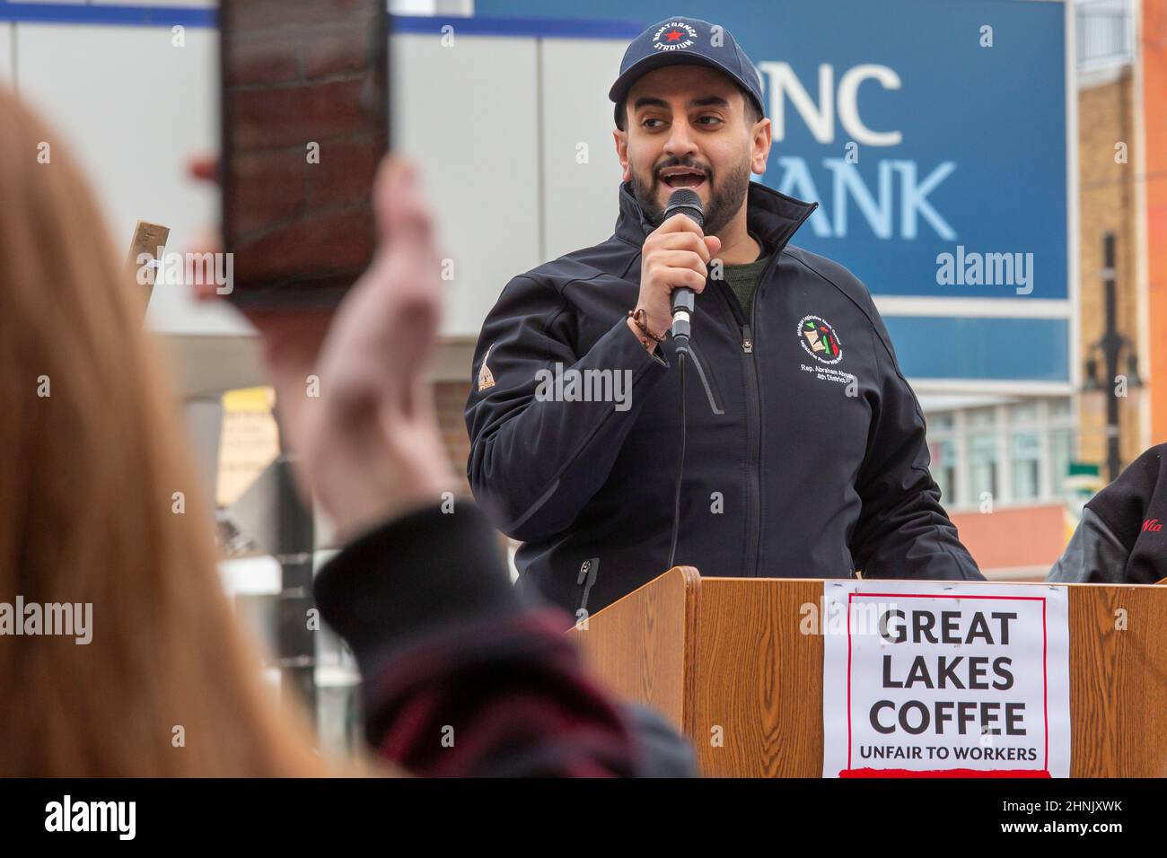 Detroit, Michigan - Michigan State Representative Abraham Aiyash speaks at a rally supporting striking workers at a Great Lakes Coffee shop. Aiyash is Stock Photo