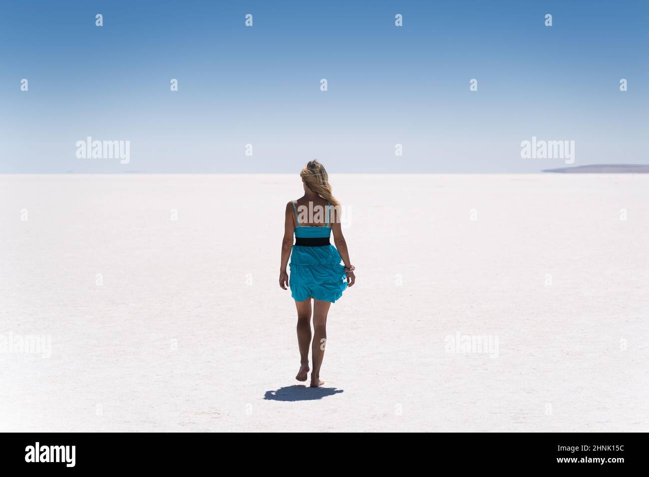 Woman walking barefoot on lake hi-res stock photography and images - Alamy