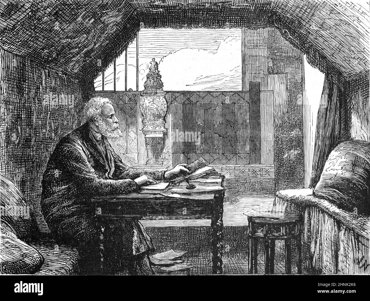 Victor Hugo (1802-1885) Working in his Study at Hauteville House, now the Victor Hugo Museum, where he lived between 1856 and 1870, in Saint Peter Port Guernesy. Vintage Illustration or Engraving 1878 Stock Photo