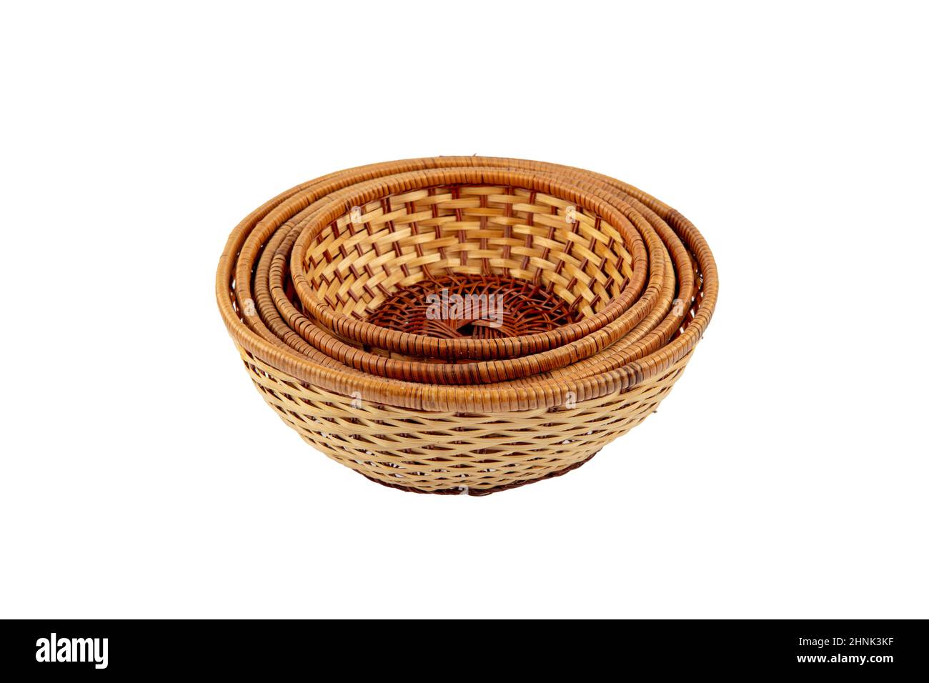 Stack of wicker straw osier handmade baskets different size and pattern