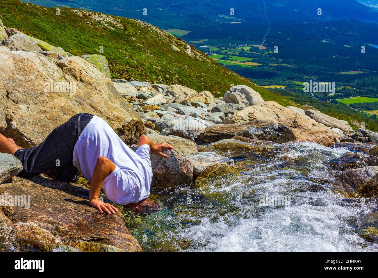 Sticking head in waterfall hires stock photography and images Alamy