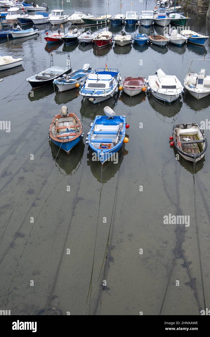 Boats moored at a dock Stock Photo - Alamy
