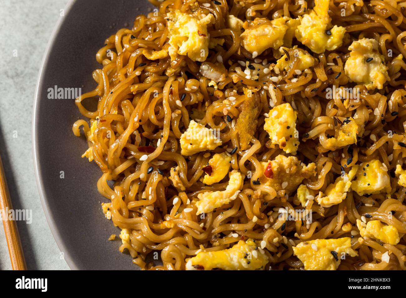 Homemand Trendy Instant Ramen Noodle Stir Fry with Eggs and Soy Sauce Stock Photo
