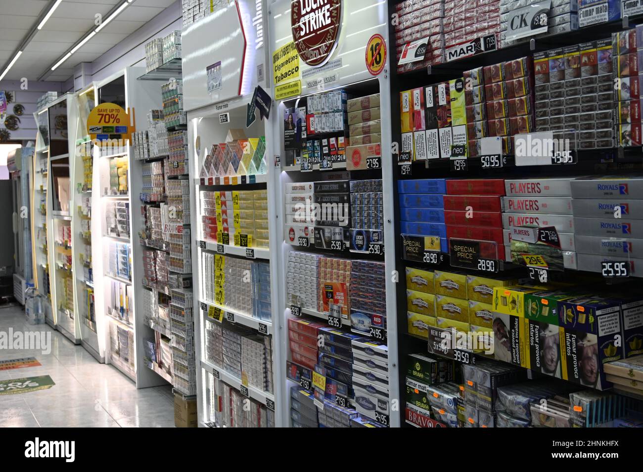 Inside a tobacconist, Tabac, with an array of Cigarettes an Tobacco on sale Stock Photo