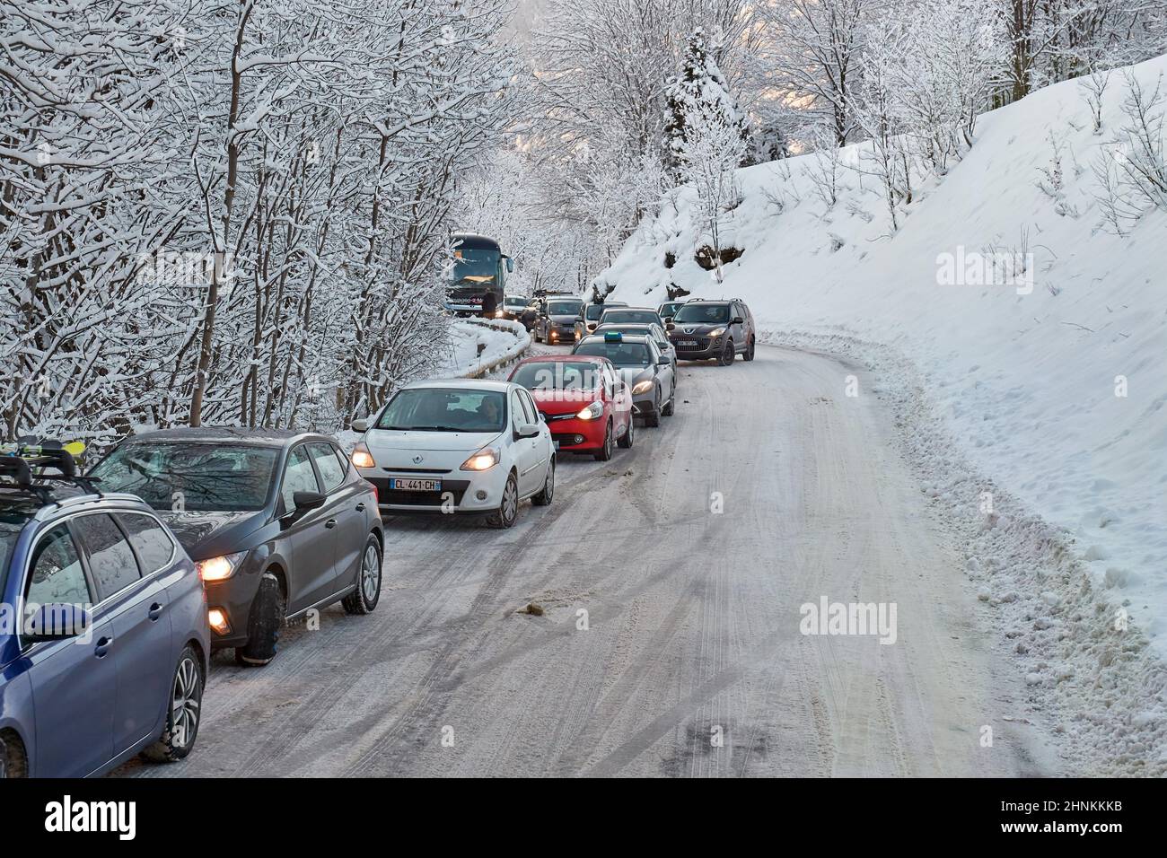 Road car congestion after snowfall in the Alps Stock Photo