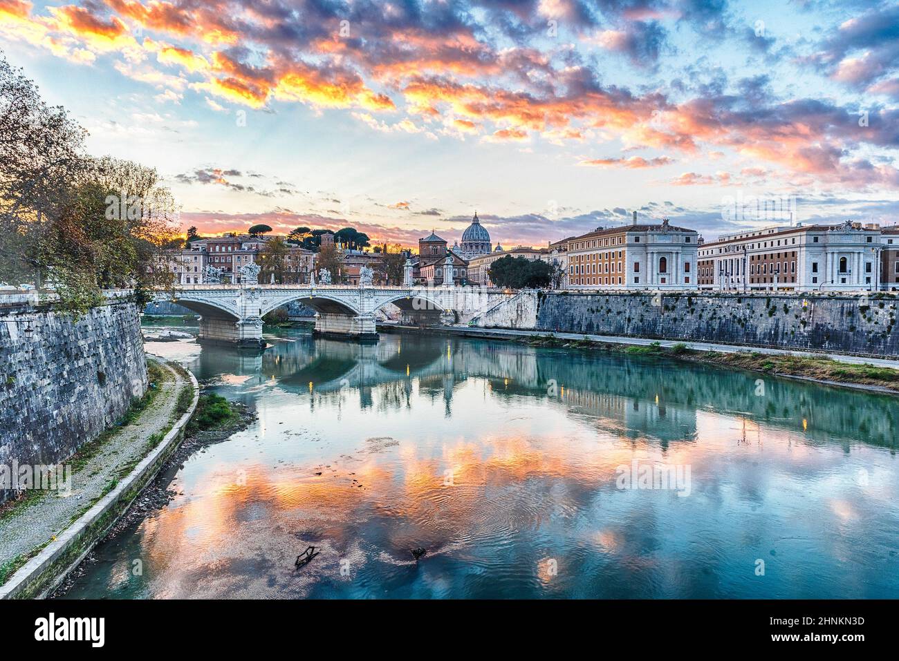 Sunset over the Tiber river in Rome, Italy Stock Photo