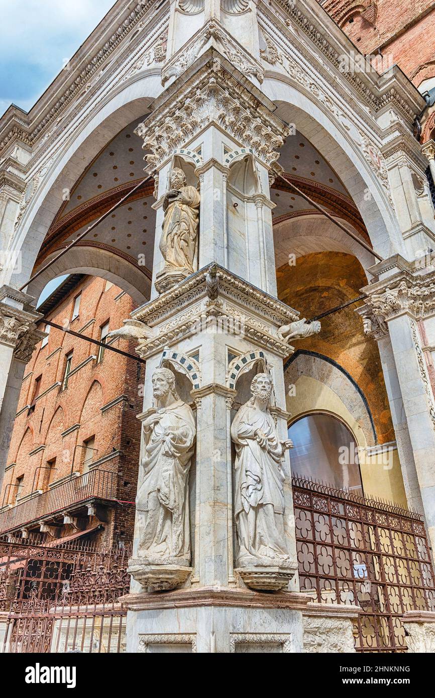 Detail of Palazzo Pubblico, main landmark in Siena, Italy Stock Photo