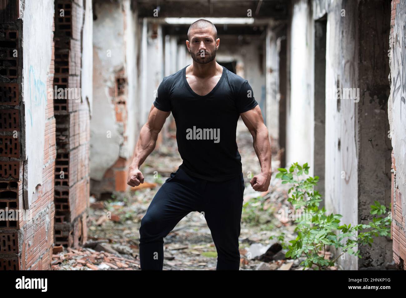 Strong Man Posing Outdoors Stock Photo - Alamy