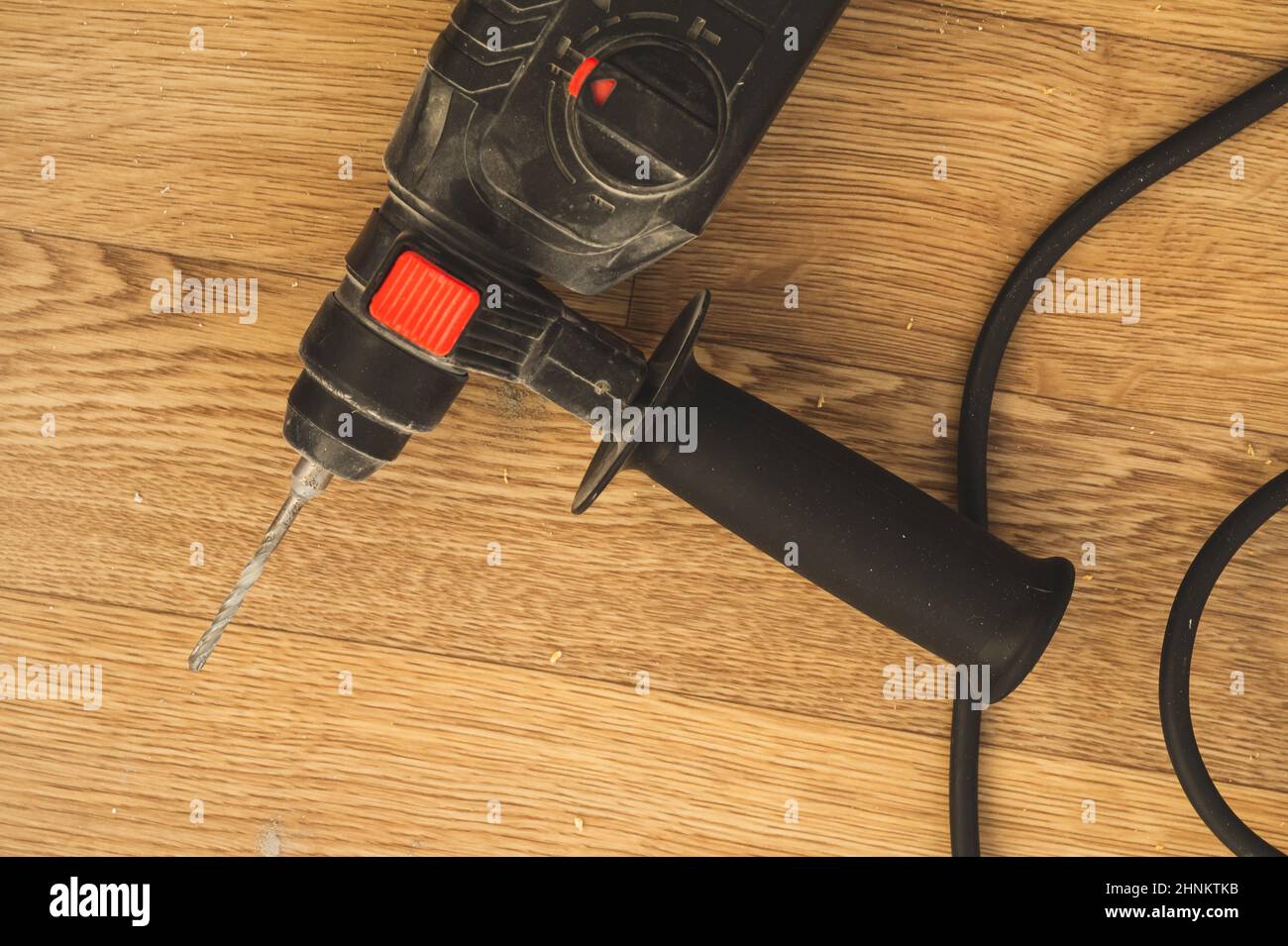 Electric drill on the floor. repair process. work instrument Stock