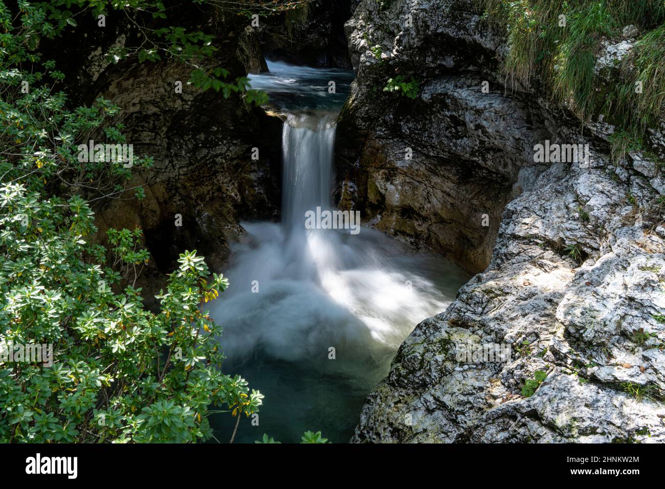 the small waterfalls of a stream that flows through the woods Stock ...