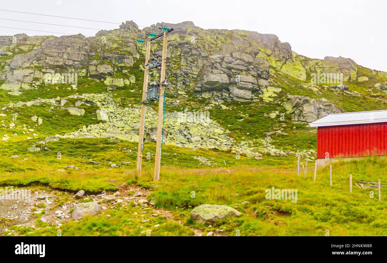 Fog, clouds, rocks and cliffs on mountain in norwegian landscape ...