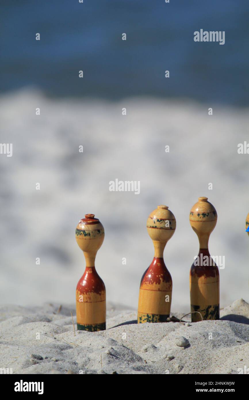 Childrens toys on the beach of the Baltic Sea. Sandpit toys. Stock Photo