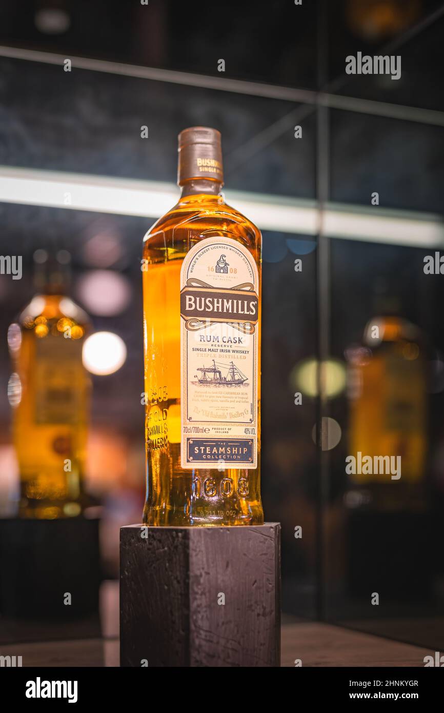 Steamship collection of Bushmills whiskey on display in distillery shop Stock Photo