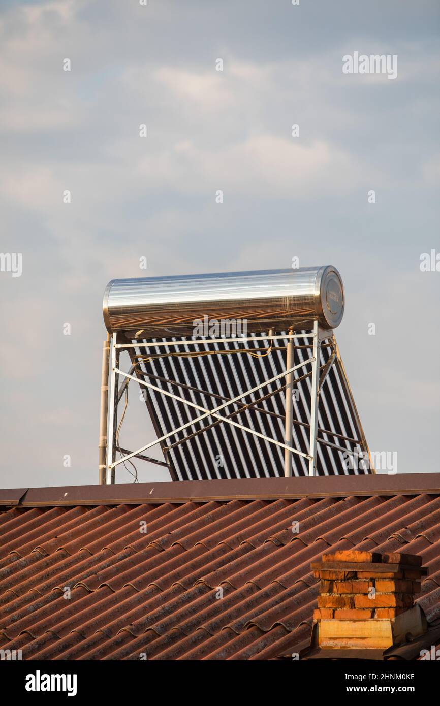 Solar water heater on rooftop Stock Photo