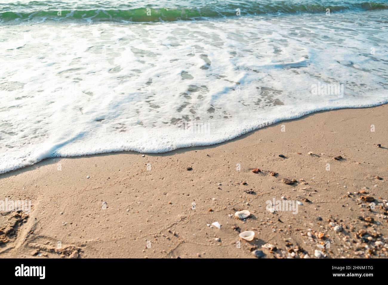 Close Up Wave Sand Beach Sea Foam. Closeup of sea wave with foam on ...