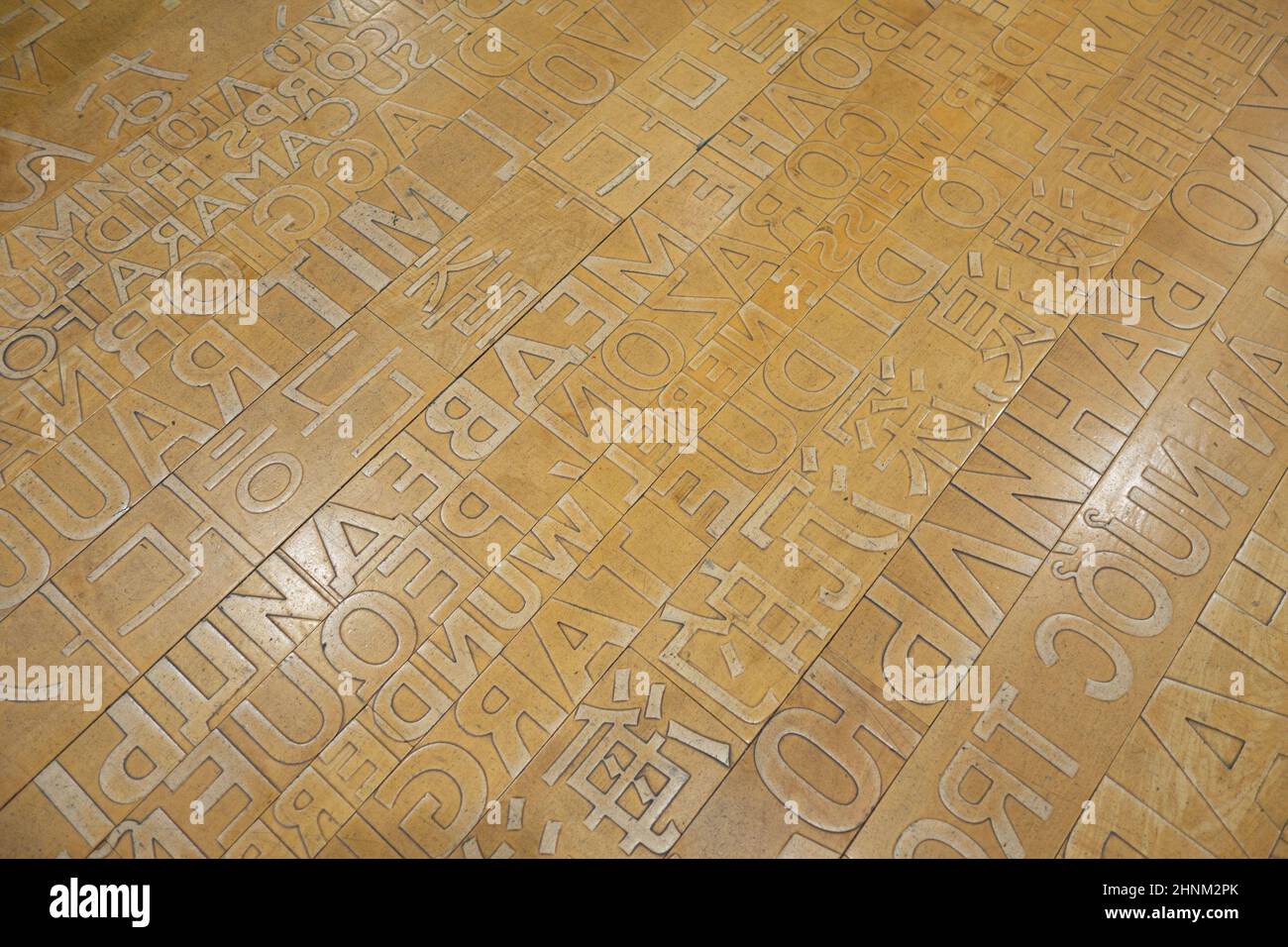 The Ann Hamilton raised lettering floor, at the Seattle Public Library, Central Library Location, in Seattle, Washington. Stock Photo