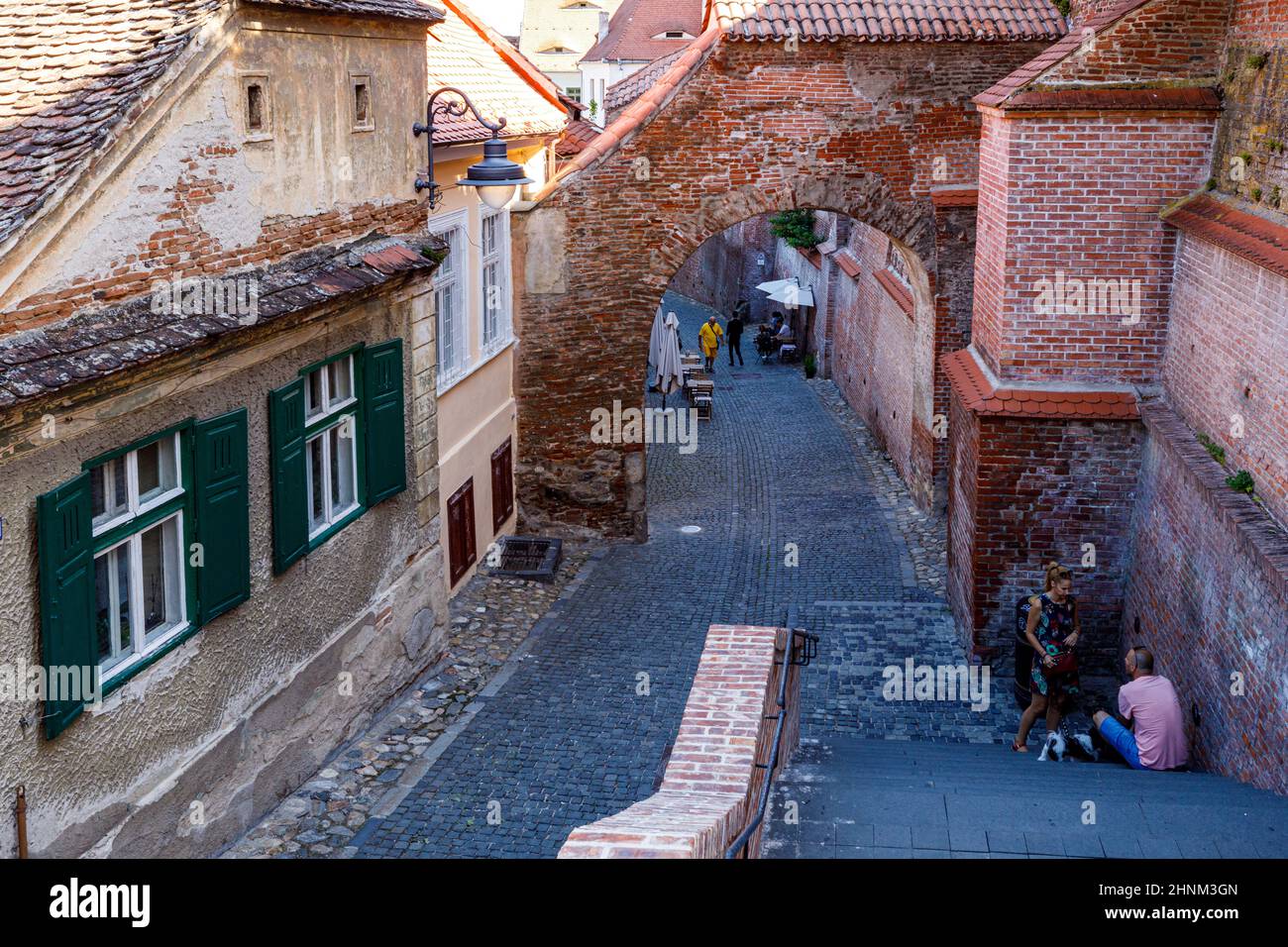 Local senior people play chess in the streets in the medieval city of  Sibiu.Transylvania.Romania Stock Photo - Alamy
