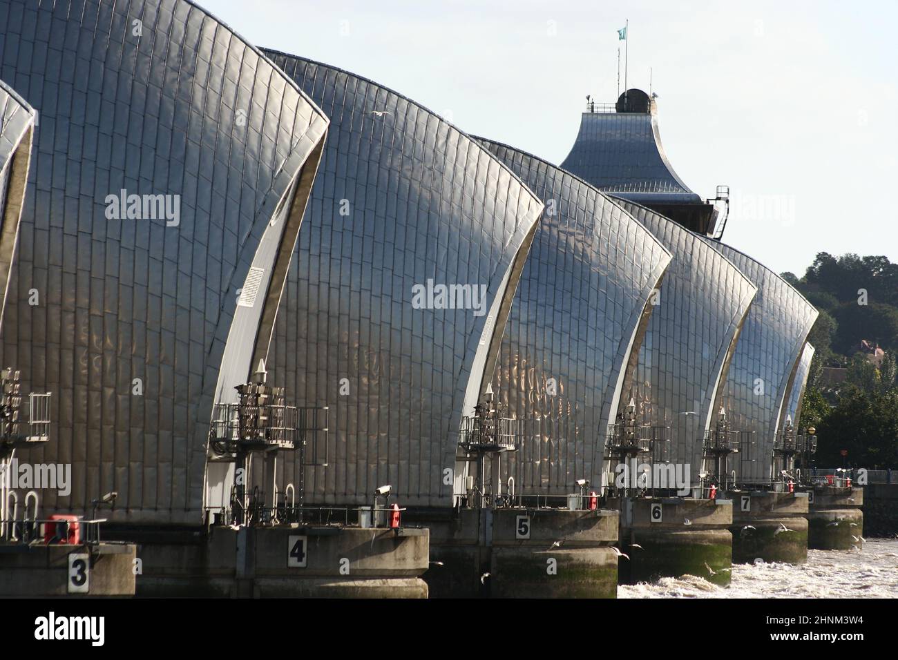 Thames flood barrier showing the symmetry of the piers Stock Photo