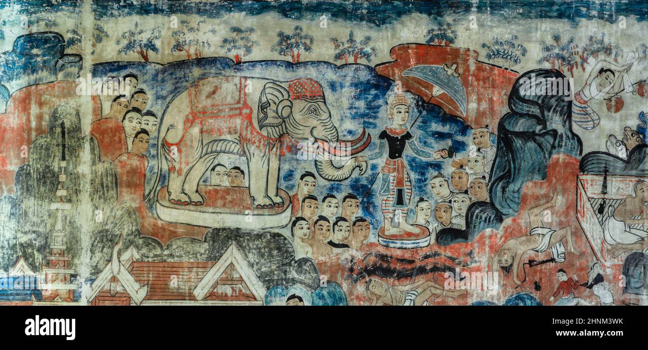 Ancient Thai Lanna style mural painting  of the life of Buddha Stock Photo