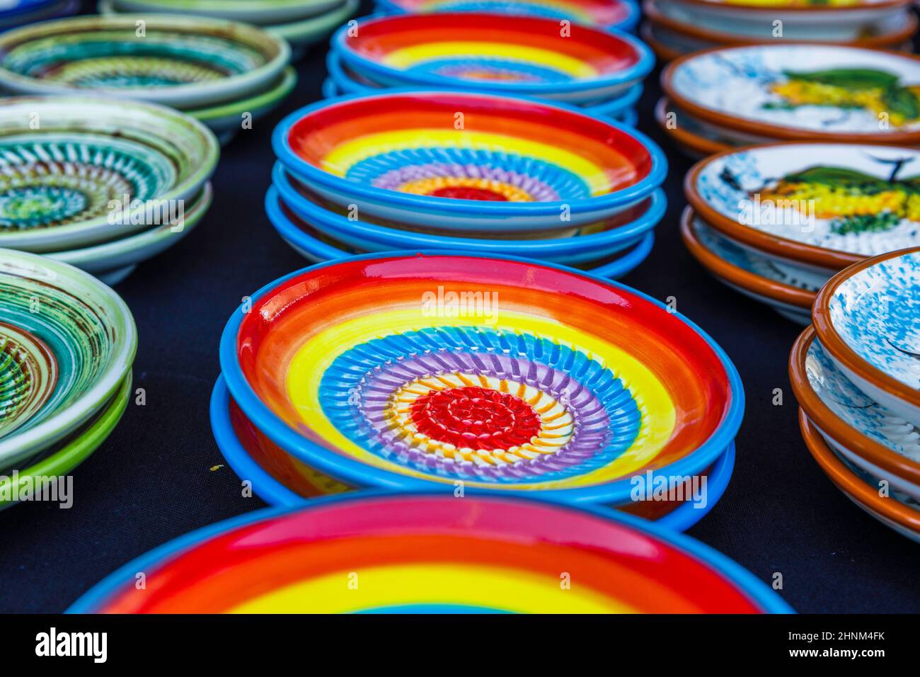 traditional ceramic market with handmade colorful plates and bowls