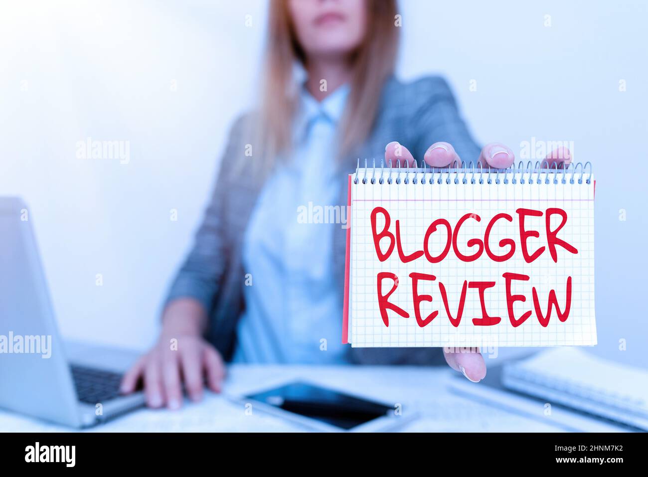 Writing displaying text Blogger Review, Concept meaning making a critical reconsideration and summary of a blog Financial Advisor Giving Money Saving Stock Photo