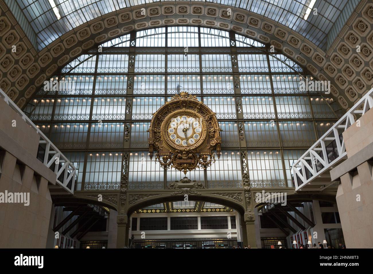PARIS -SEPTEMBER 7, 2014: Golden clock of the museum D'Orsay in Paris, France. Musee d'Orsay has the largest collection of impressionist and post-impressionist paintings in the world. Stock Photo