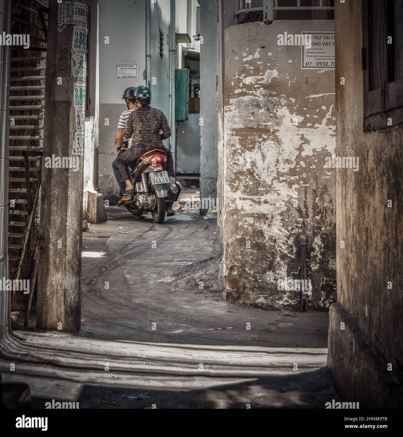4th June 2016, Vietnam, Nha-Trang, two people on moped Stock Photo