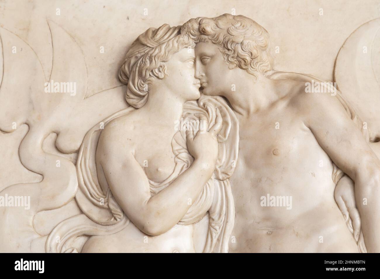 Ancient sculpture with kissing couple, Florence - Italy Stock Photo