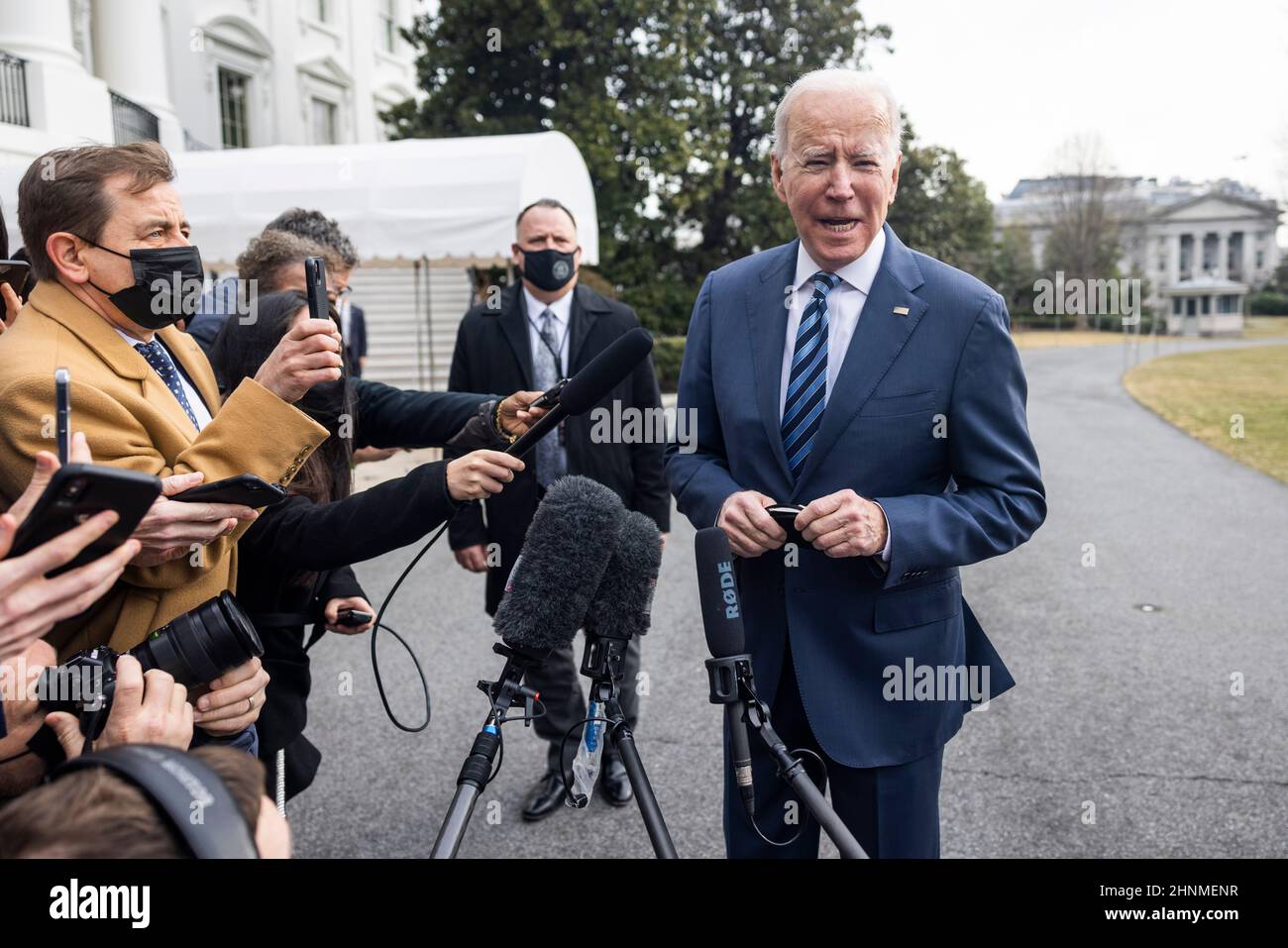 United States President Joe Biden speaks to the media about Russia's buildup on the Ukrainian border as he departs the White House for Cleveland in Washington, DC, USA, 17 February 2022. The president said there is a ‘very high' risk of a Russian invasion of Ukraine in ‘several days.' NATO and the Biden White House have dismissed Russian claims that they are drawing down troops on the Ukrainian border.Credit: Jim LoScalzo/Pool via CNP /MediaPunch Stock Photo