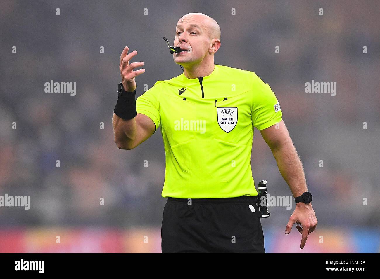 Milan, Italy. 16 February 2022. Referee Szymon Marciniak gestures during the Champions League round of sixteen first leg football match between FC Internazionale and Liverpool FC. Credit: Nicolò Campo/Alamy Live News Stock Photo