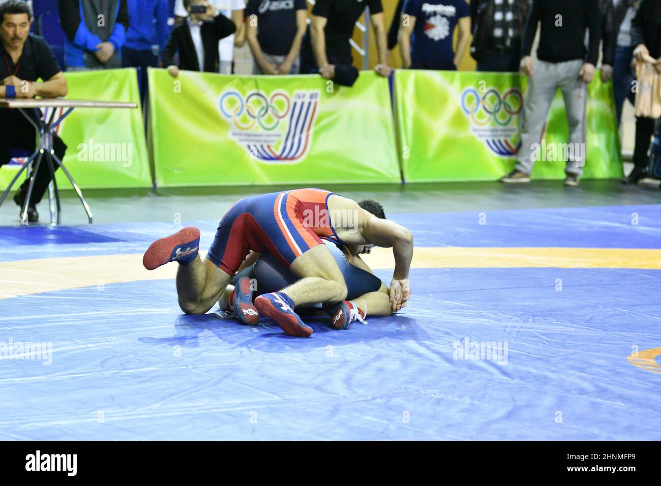 Orenburg, Russia - March 15-16, 2017: Boy compete in sports wrestling Stock Photo