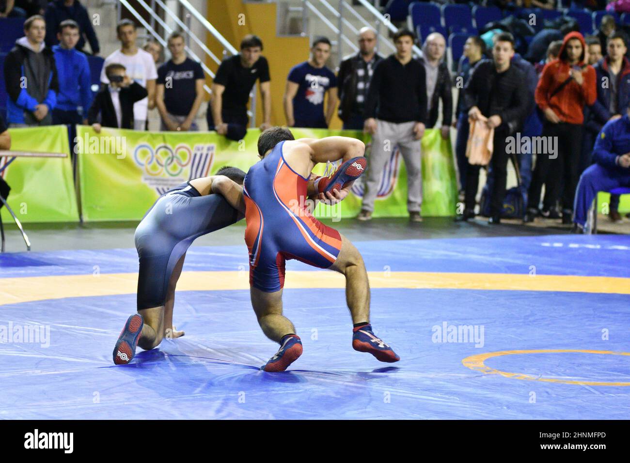 Orenburg, Russia - March 15-16, 2017: Boy compete in sports wrestling Stock Photo