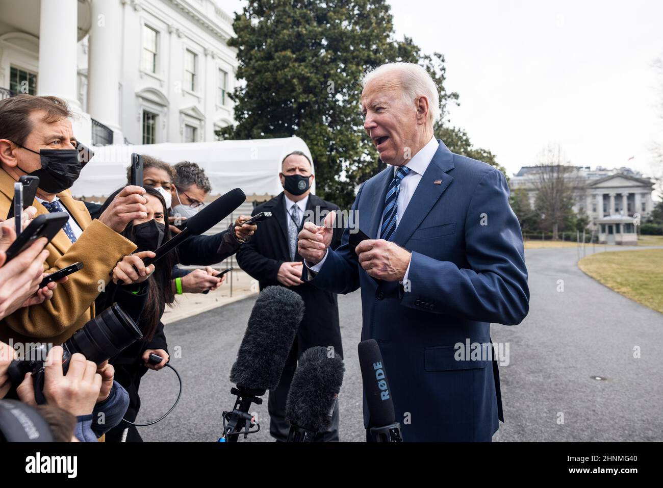 United States President Joe Biden speaks to the media about Russia's buildup on the Ukrainian border as he departs the White House for Cleveland in Washington, DC, USA, 17 February 2022. The president said there is a ‘very high' risk of a Russian invasion of Ukraine in ‘several days.' NATO and the Biden White House have dismissed Russian claims that they are drawing down troops on the Ukrainian border.Credit: Jim LoScalzo/Pool via CNP /MediaPunch Stock Photo