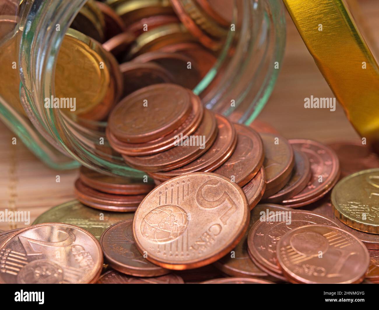 Euro cent coins in a screw-top jar Stock Photo