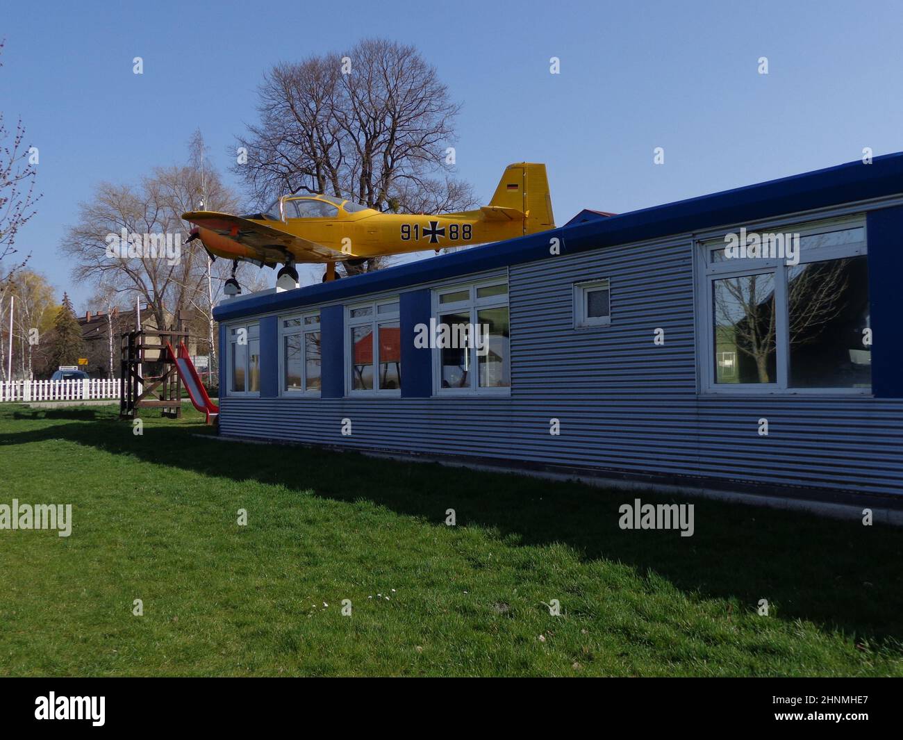 EDCB Ballenstedt airfield functional building with aircraft on the roof Stock Photo