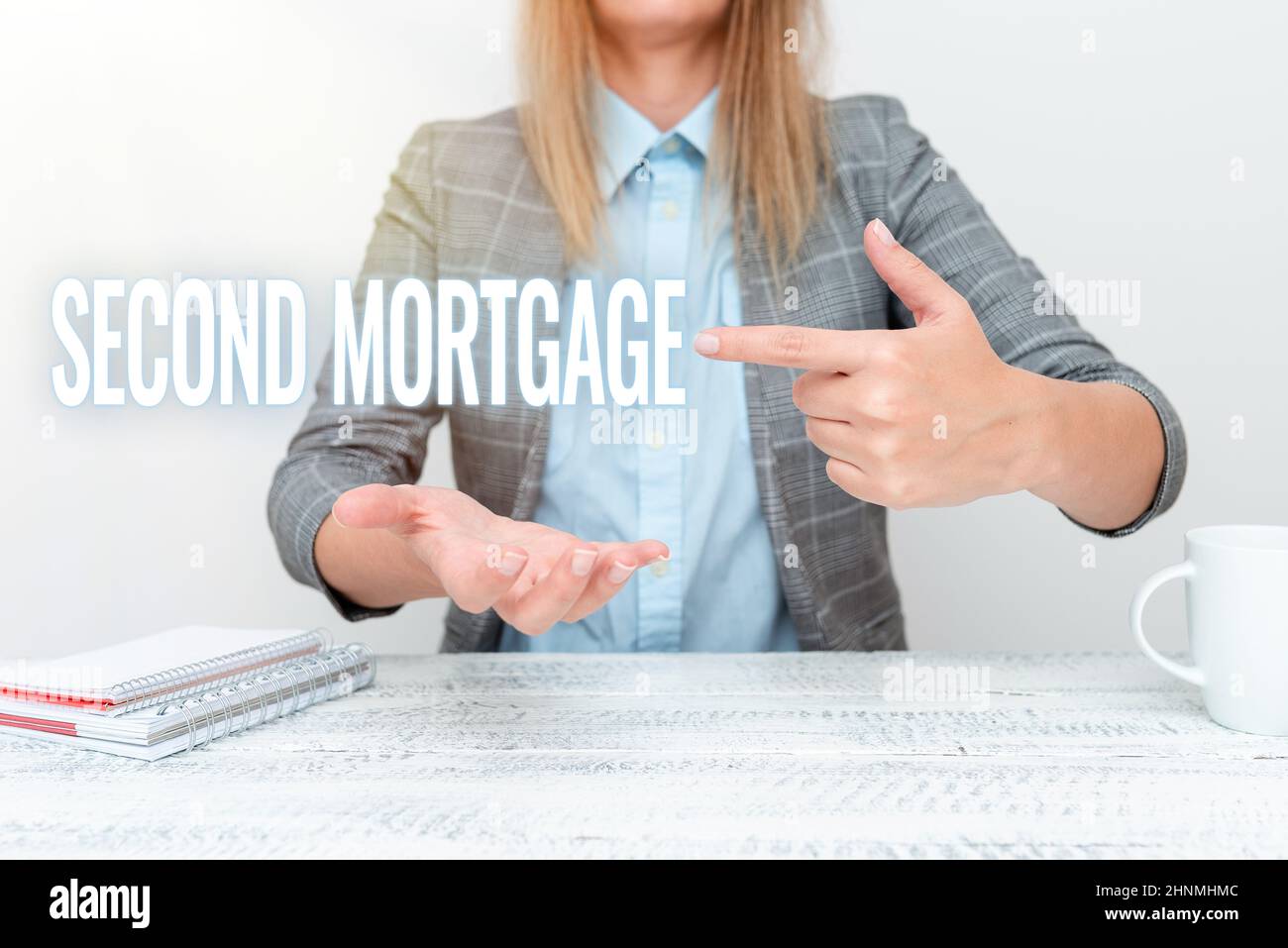 Hand writing sign Second Mortgage, Business approach lien on property which is subordinate to more senior one Explaining New Business Plans, Orientati Stock Photo