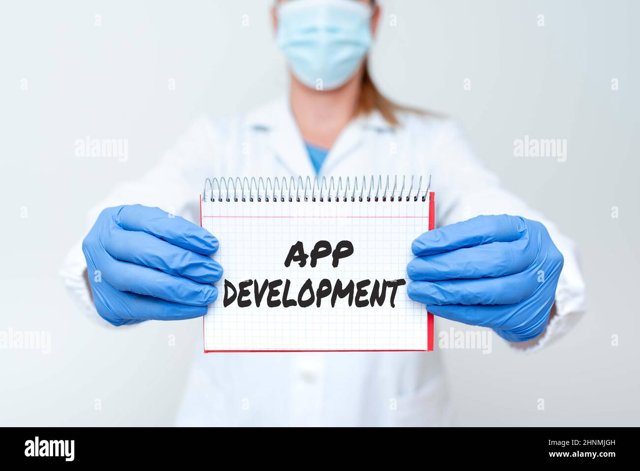 Handwriting text App Development, Business concept Development services for awesome mobile and web experiences Demonstrating Medical Ideas Presenting Stock Photo