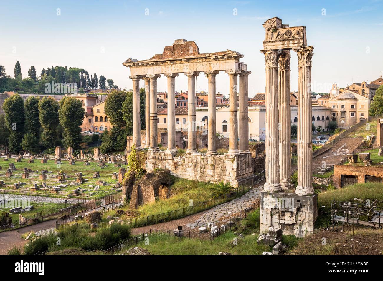 Sunrise light with blue sky on Roman ancient architecture in Rome, Italy Stock Photo