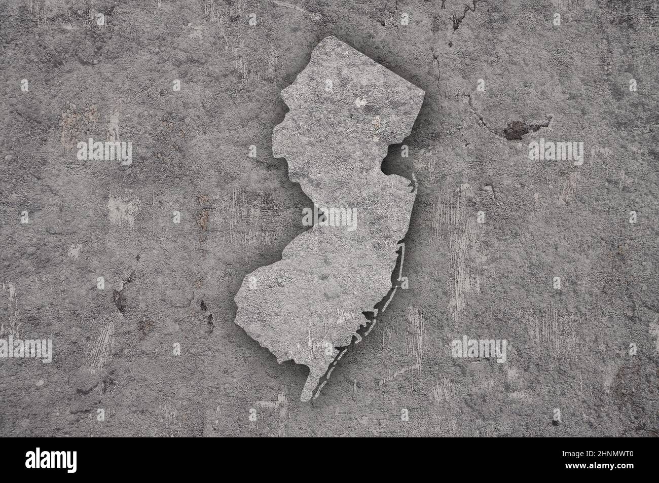 Map of New Jersey on weathered concrete Stock Photo