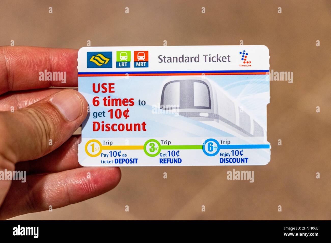 MRT LRT Standard Ticket metro subway, Singapore. hold in hand Stock