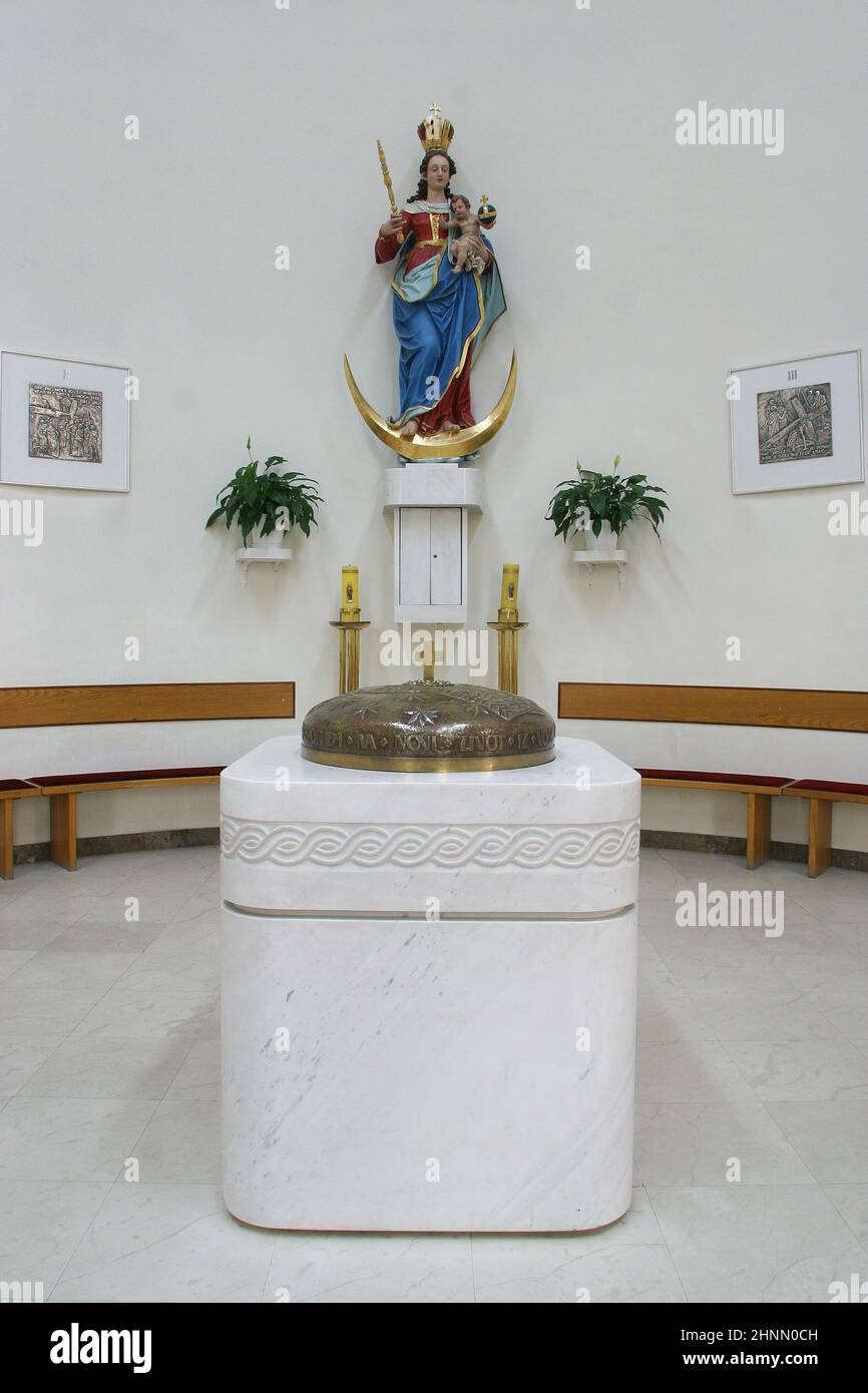 Baptismal font in the parish church of St. Paul in Retkovec, Zagreb, Croatia Stock Photo