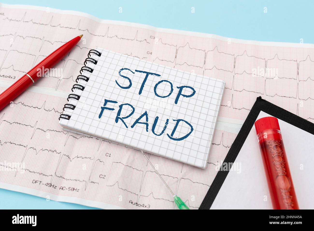 Conceptual display Stop Fraud. Business showcase campaign advices showing to watch out thier money transactions Reading Graph And Writing Important Medical Notes Test Result Analysis Stock Photo