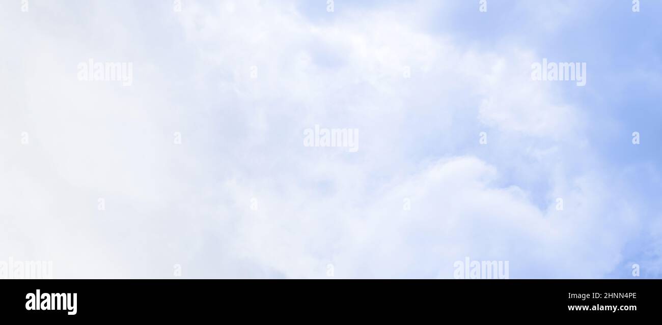 Blue sky background with white clouds. Panorama Stock Photo - Alamy