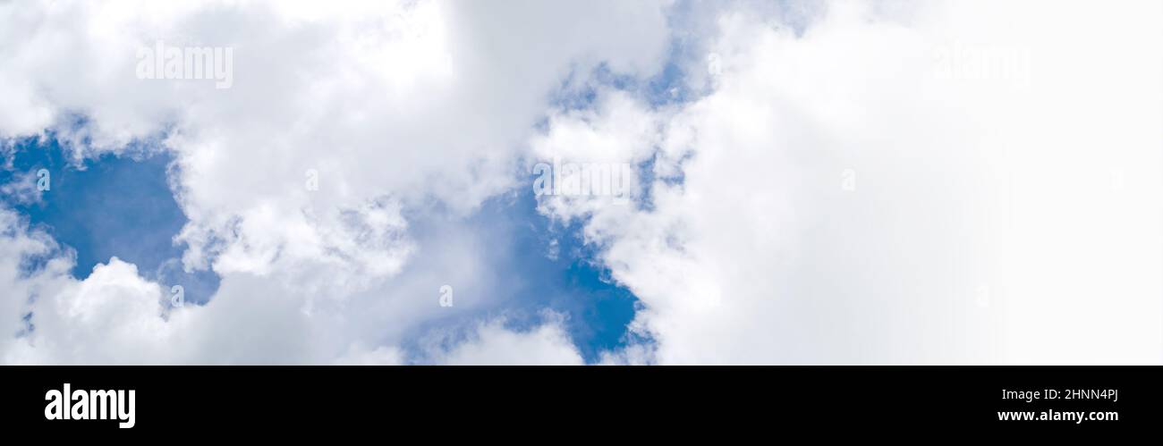 Blue sky background with white clouds. Panorama Stock Photo - Alamy