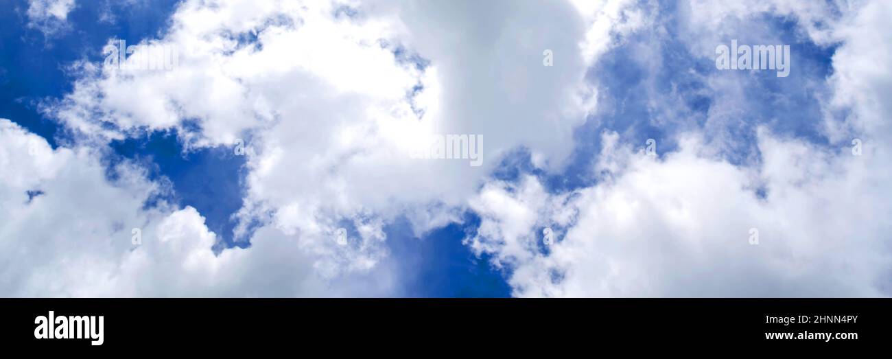 Blue sky background with white clouds. Panorama Stock Photo - Alamy