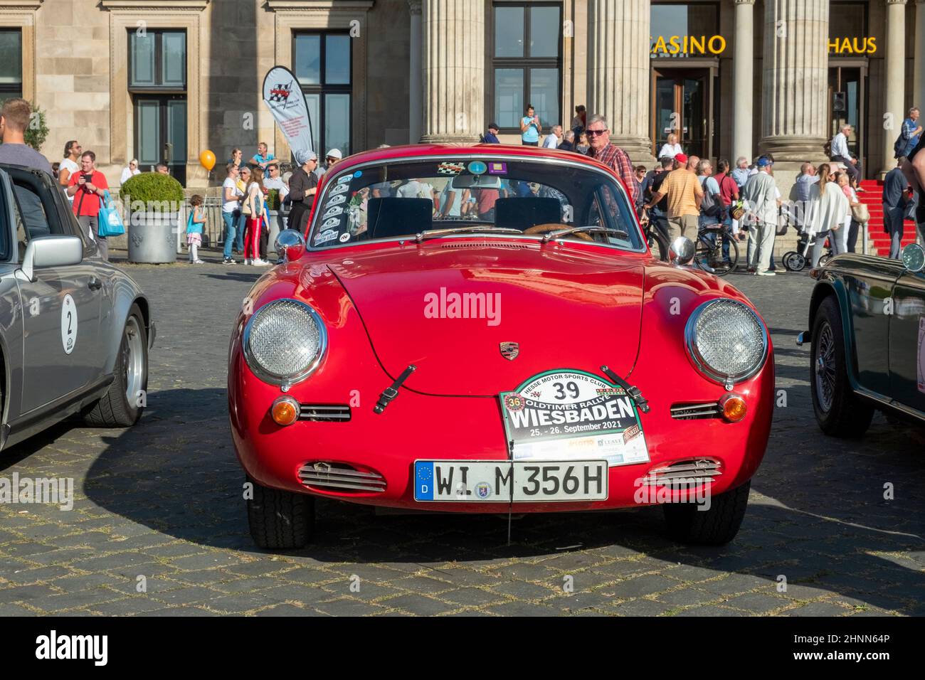 the Porsche 356 SC 1600 reaches the final goal  of the Oldtimer ralley Wiesbaden in Wiesbaden after a challenge in the Rheingau, Germany. Stock Photo